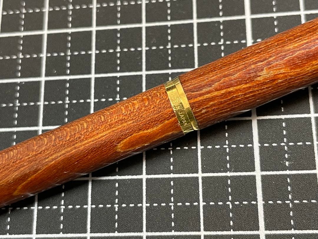 Pilot Grandee ballpoint pen with brown wooden body and gold metal accents