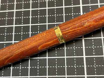 Pilot Grandee ballpoint pen with brown wooden body and gold metal accents