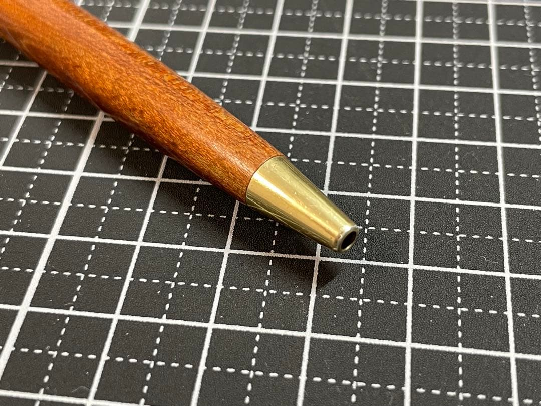 Pilot Grandee ballpoint pen with brown wooden body and gold metal accents