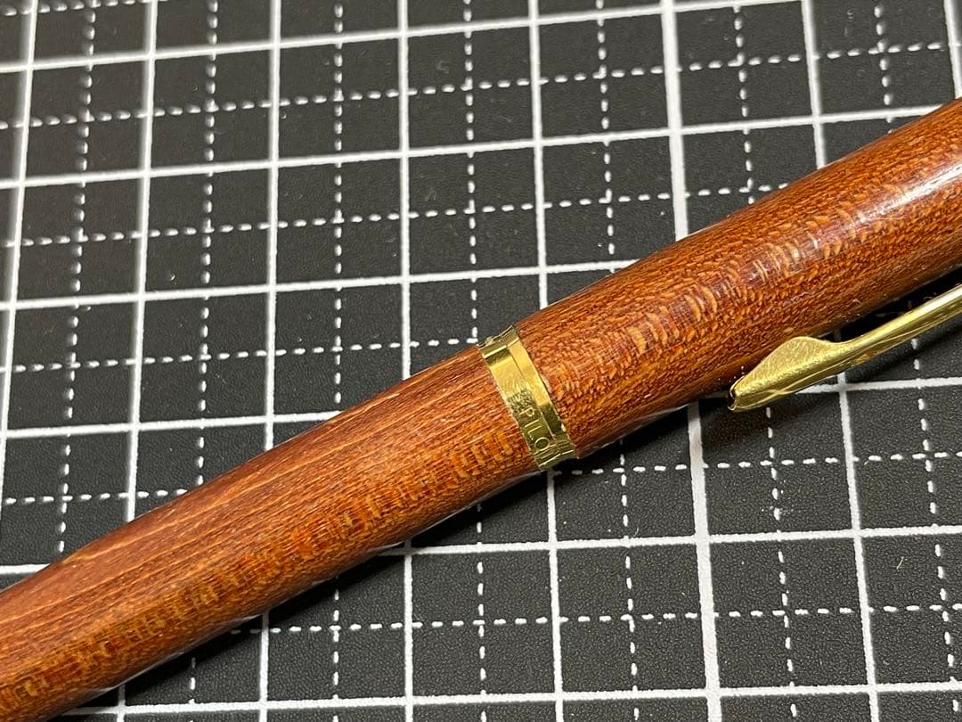 Pilot Grandee ballpoint pen with brown wooden body and gold metal accents