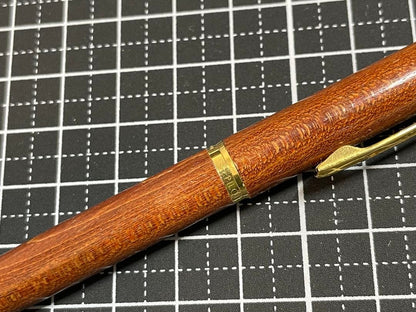 Pilot Grandee ballpoint pen with brown wooden body and gold metal accents