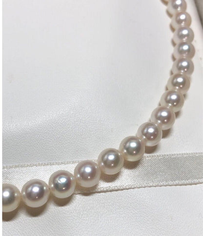 Jewelry Mak Akoya Pearl Necklace featuring white round pearls sized 7.0-7.5 mm on a 42 cm strand