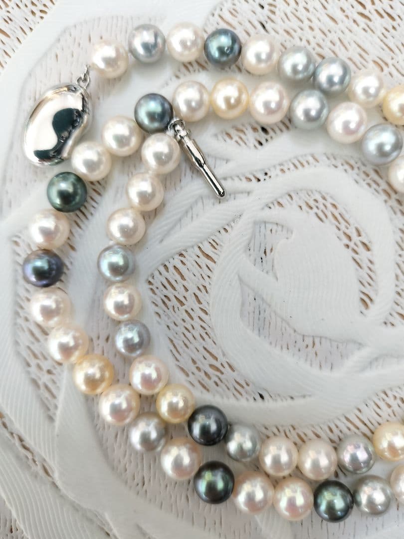 Akoya pearl necklace with 6mm round white, gold, green, and light gray pearls on a 42.5cm strand with silver push clasp