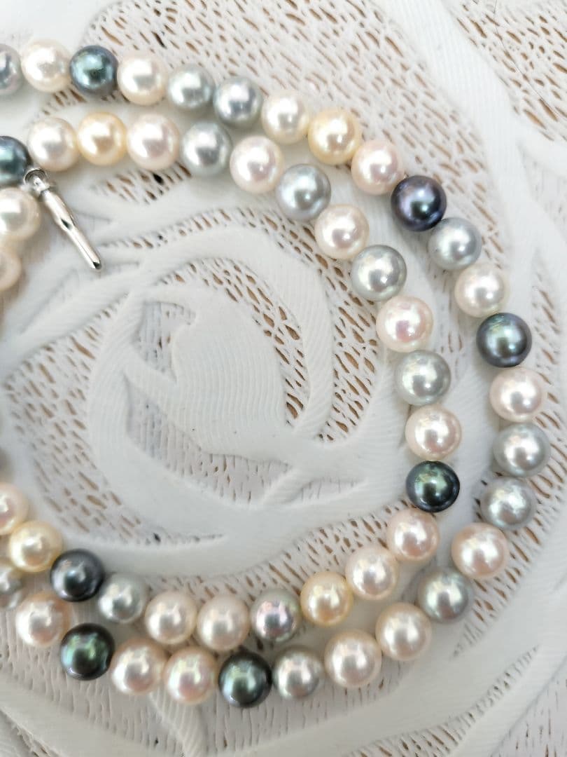 Akoya pearl necklace with 6mm round white, gold, green, and light gray pearls on a 42.5cm strand with silver push clasp