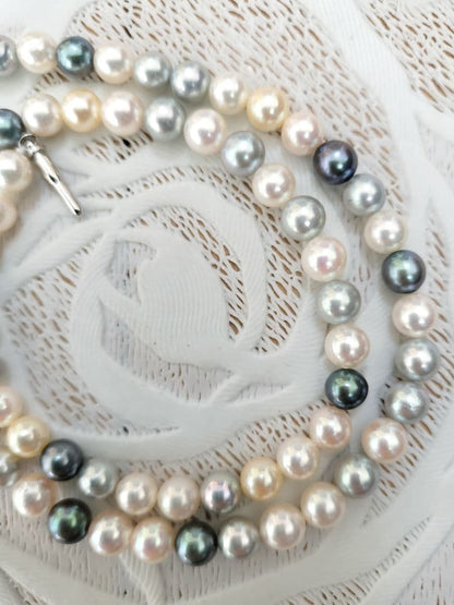 Akoya pearl necklace with 6mm round white, gold, green, and light gray pearls on a 42.5cm strand with silver push clasp