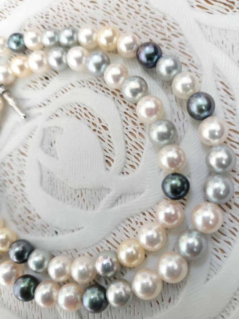 Akoya pearl necklace with 6mm round white, gold, green, and light gray pearls on a 42.5cm strand with silver push clasp
