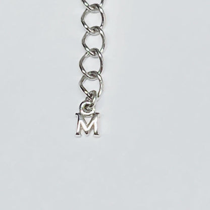 MIKIMOTO pearl necklace choker with 6.2mm pearls and sterling silver M charm on a 43.5cm adjustable chain