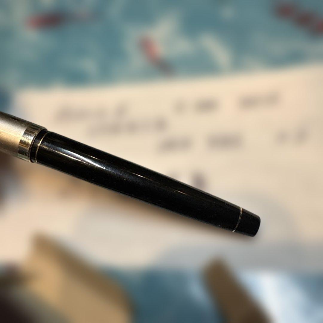 Pilot E-300 GU17 limited edition fountain pen with 14K gold coarse nib and black barrel shown writing characters