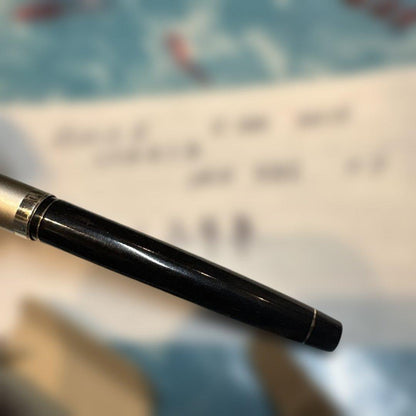 Pilot E-300 GU17 limited edition fountain pen with 14K gold coarse nib and black barrel shown writing characters