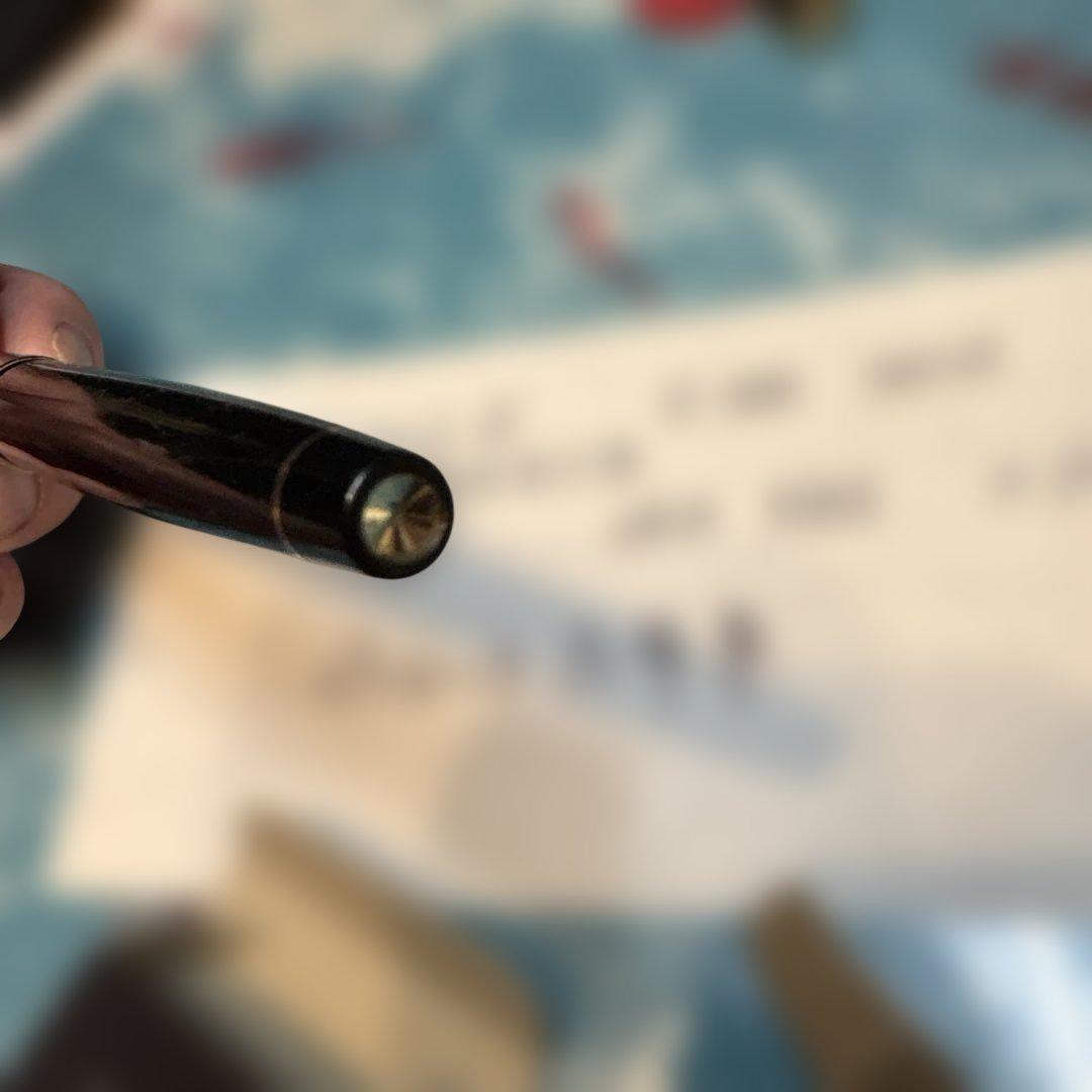 Pilot E-300 GU17 limited edition fountain pen with 14K gold coarse nib and black barrel shown writing characters