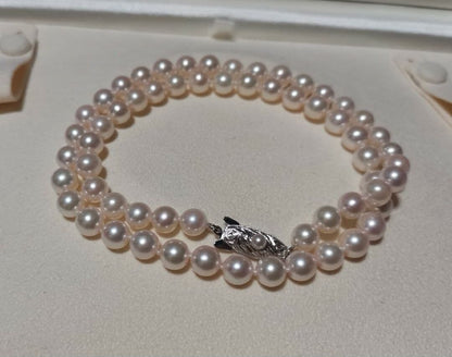 Tasaki Akoya pearl necklace with light pink pearls 6.5-7mm sized on a 45cm strand with T S brand mark