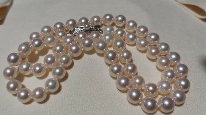 Tasaki Akoya pearl necklace with light pink pearls 6.5-7mm sized on a 45cm strand with T S brand mark