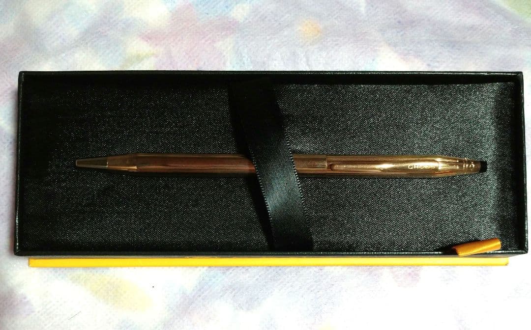 Kuro Century ballpoint pen with 10-karat gold plating and conical cap top by Cross