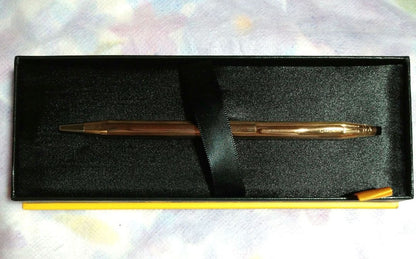 Kuro Century ballpoint pen with 10-karat gold plating and conical cap top by Cross