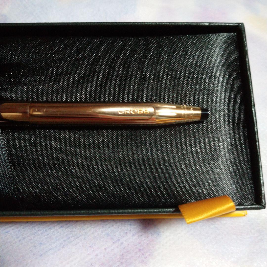 Kuro Century ballpoint pen with 10-karat gold plating and conical cap top by Cross