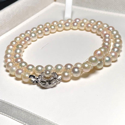 Akoya pearl necklace with 6.5-7.0mm white round pearls and silver chain, 48cm length