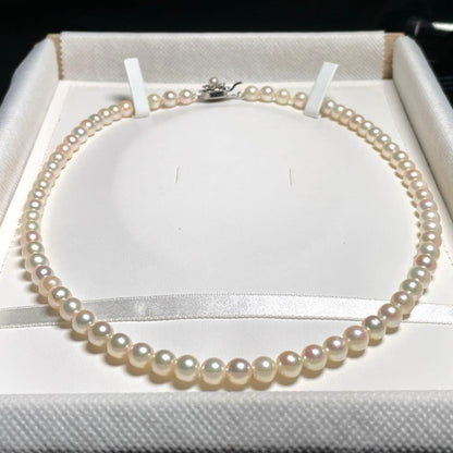 Akoya pearl necklace with 6.5-7.0mm white round pearls and silver chain, 48cm length