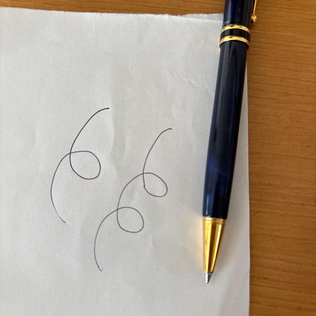 Pilot ballpoint pen with blue body, gold decorative accents, two-tone design, and rotating mechanism