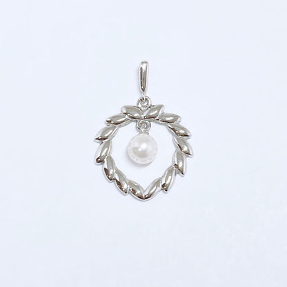 Mikimoto Pearl Necklace Top Leaf made of silver with pearl accent, delicate and elegant design