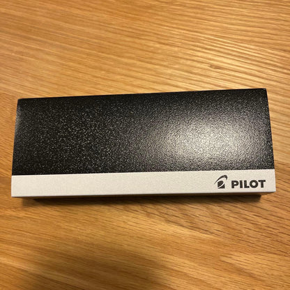 New unused PILOT ballpoint pen in black color on white background