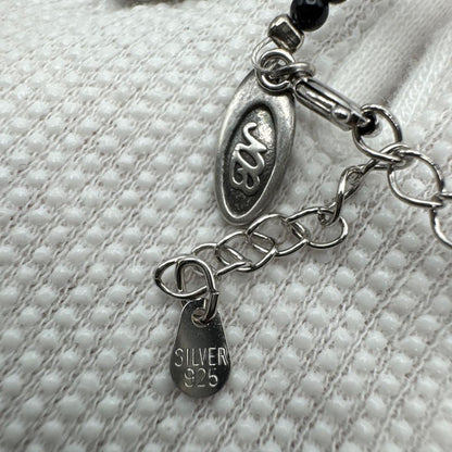 Mikimoto M Mark genuine pearl pendant with thin black coral silver bead necklace on white background