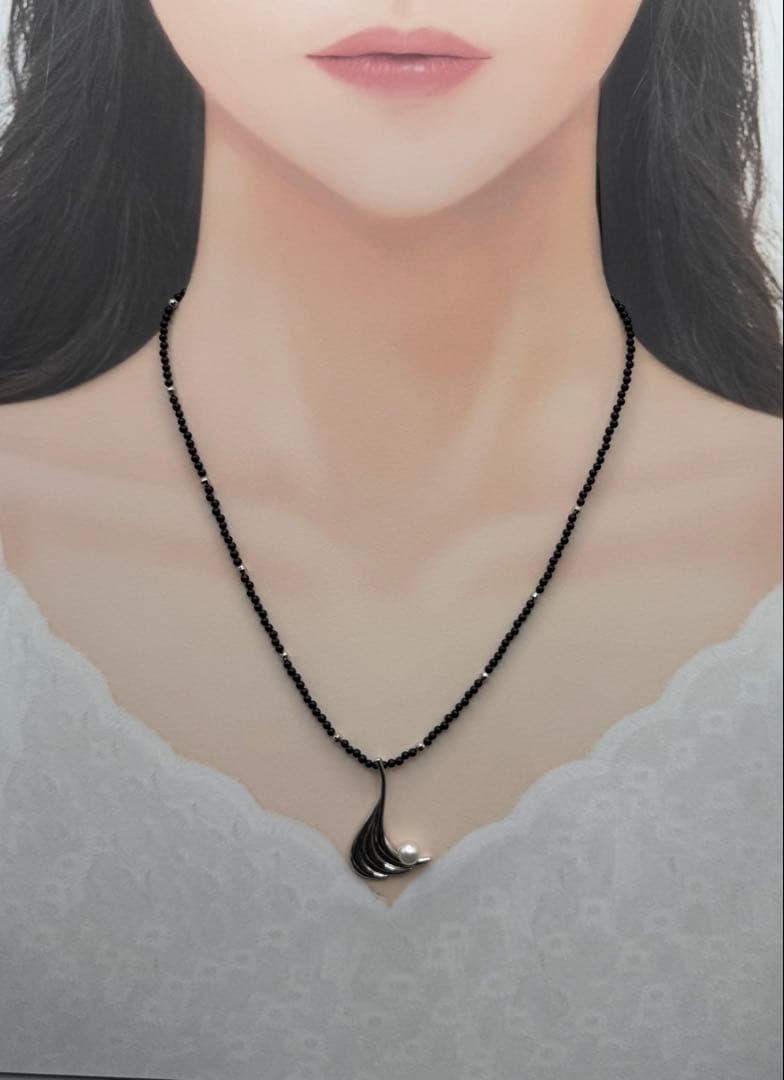 Mikimoto M Mark genuine pearl pendant with thin black coral silver bead necklace on white background