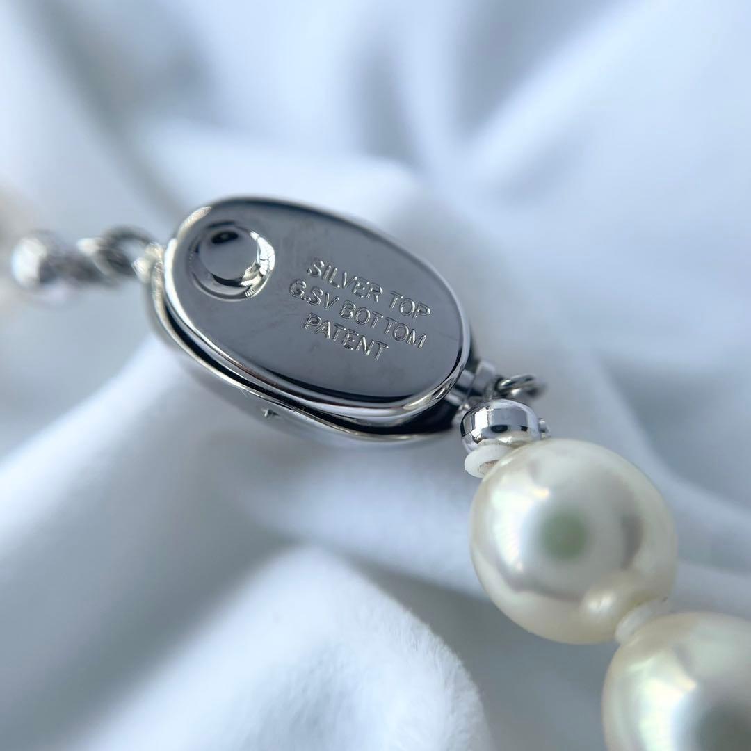 Akoya first-class pearl necklace with 7 to 7.5mm pearls and silver clasp on a white background