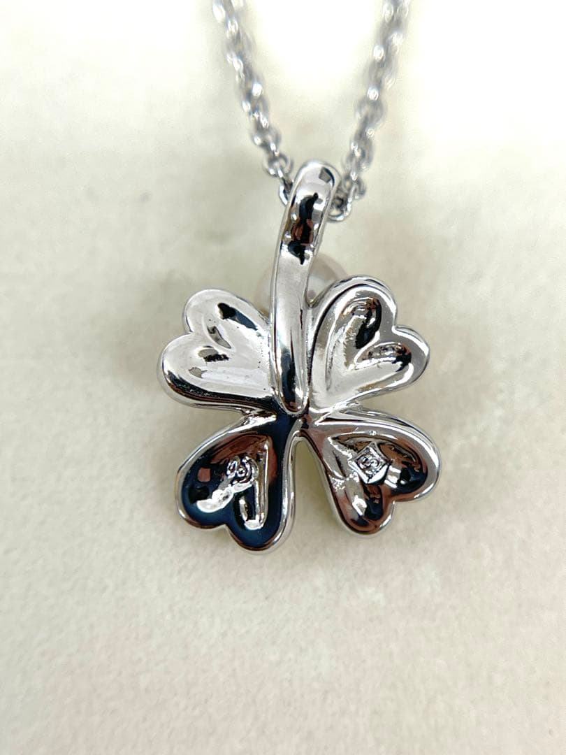 TASAKI Clover Pearl Necklace with silver chain and clover-shaped pearl motif, 42 cm length