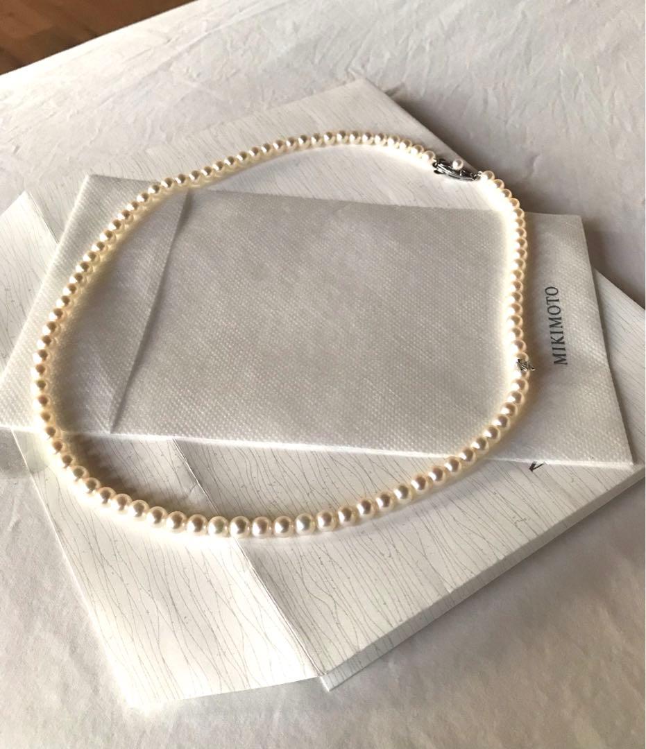 Mikimoto pearl necklace with M charm in white gold featuring 5.5-5.9mm pearls and pouch