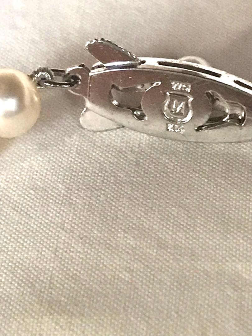 Mikimoto pearl necklace with M charm in white gold featuring 5.5-5.9mm pearls and pouch