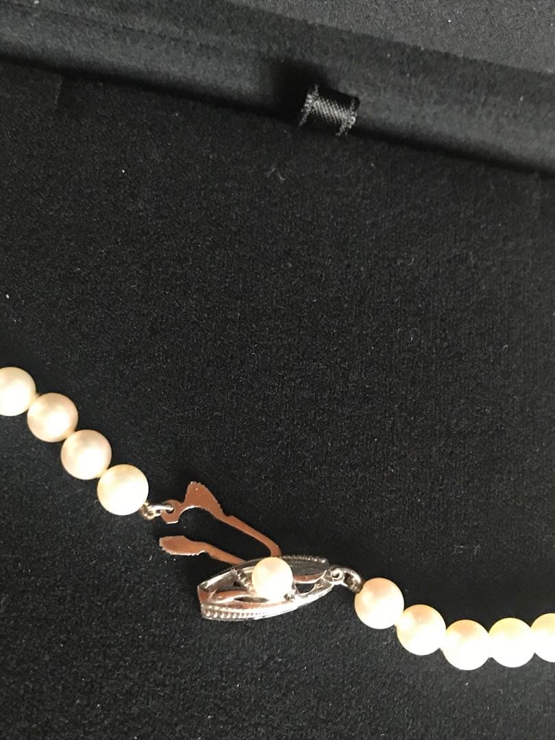 Mikimoto pearl necklace with M charm in white gold featuring 5.5-5.9mm pearls and pouch