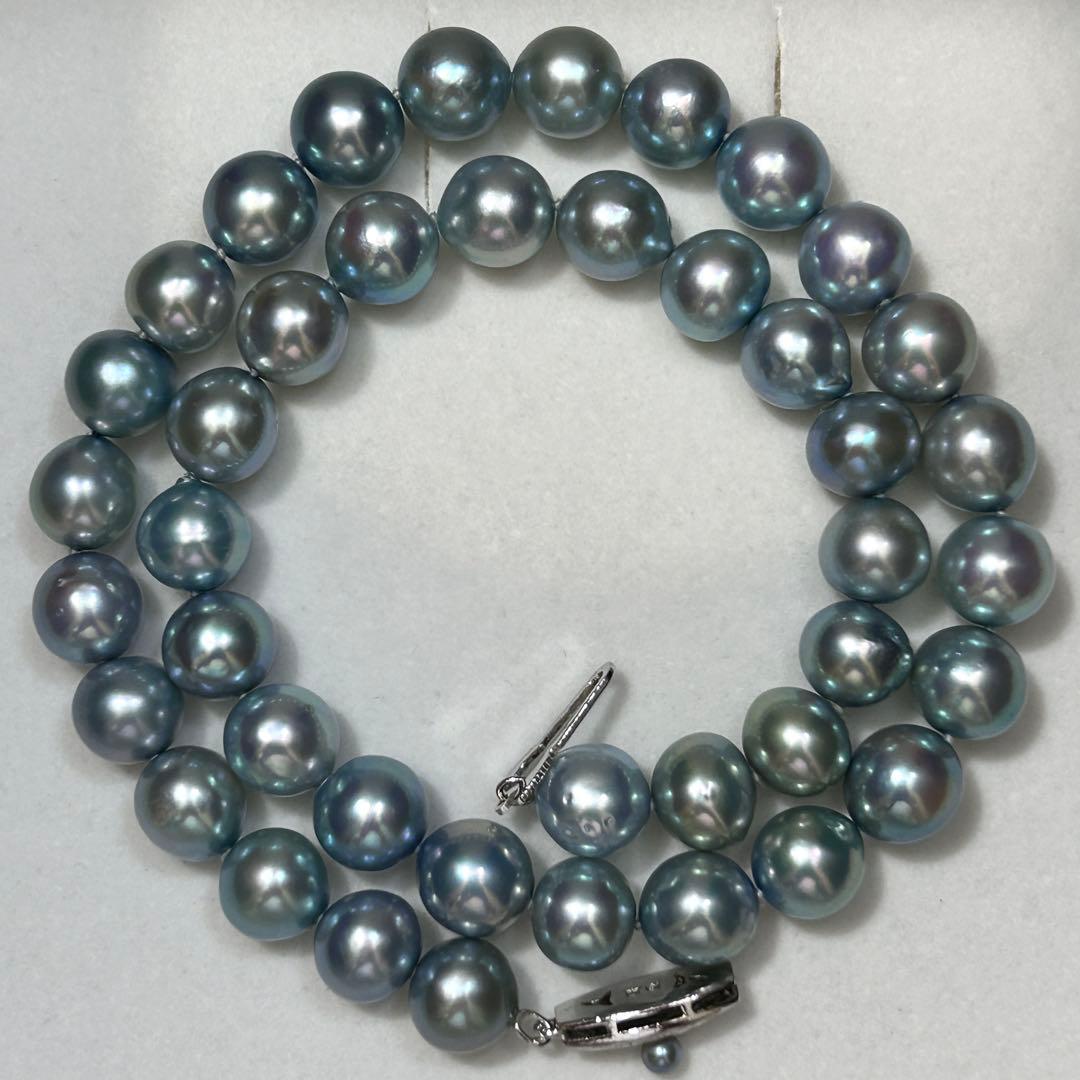 Tasaki Akoya pearl necklace with 9.7mm pearls, 46g weight, and 43cm sterling silver chain