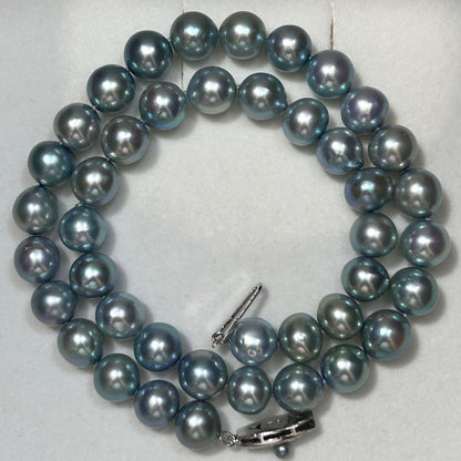 Tasaki Akoya pearl necklace with 9.7mm pearls, 46g weight, and 43cm sterling silver chain