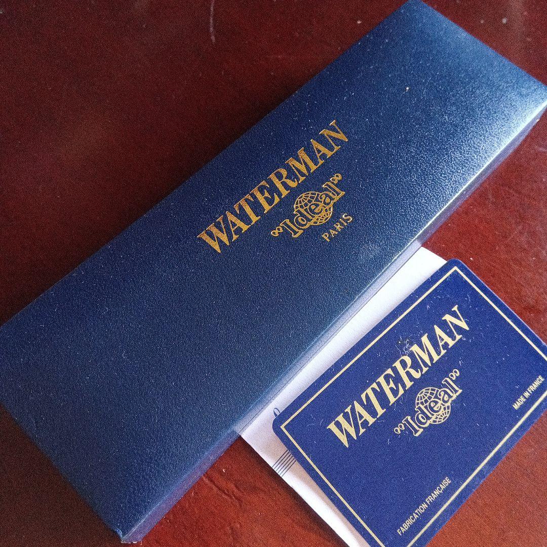 Waterman Exclusive ballpoint pen with black ink refill resting in an open France case