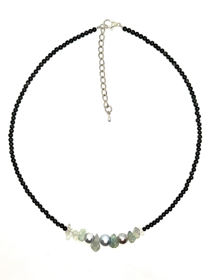 Akoya pearl necklace with natural blue pearls, aquamarine stones, and black tourmaline on a 42 to 47 cm chain