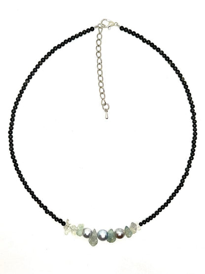 Akoya pearl necklace with natural blue pearls, aquamarine stones, and black tourmaline on a 42 to 47 cm chain