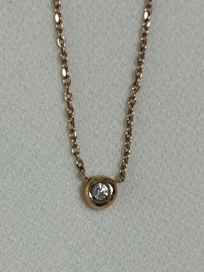 Agete K10 pink gold necklace with a single 0.05ct diamond pendant on a delicate chain
