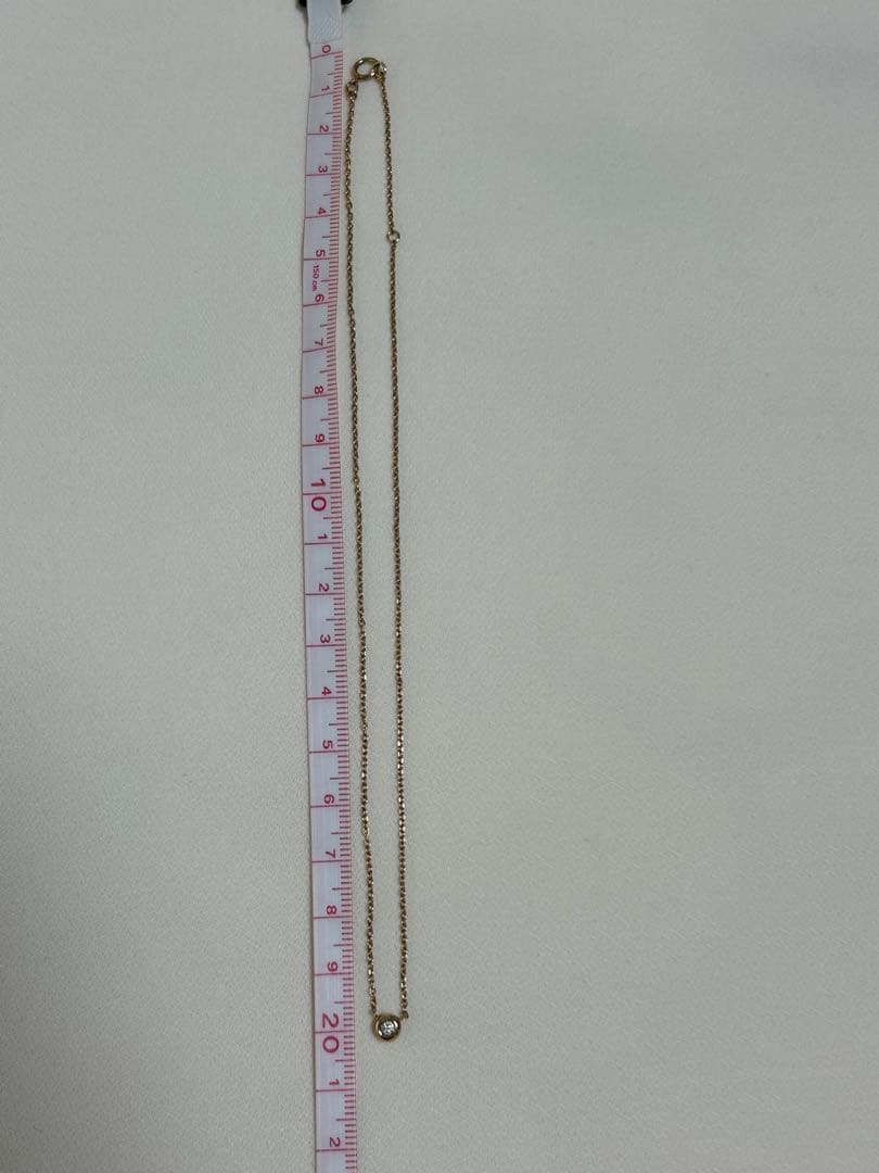 Agete K10 pink gold necklace with a single 0.05ct diamond pendant on a delicate chain