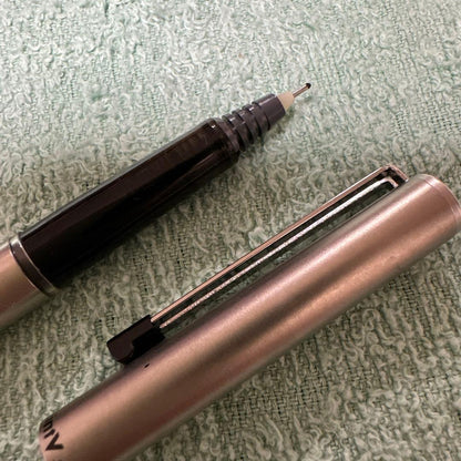 PILOT Hi-Tecpoint V Ballpoint Pen Silver 44 ballpoint pen with visible aging damage as shown