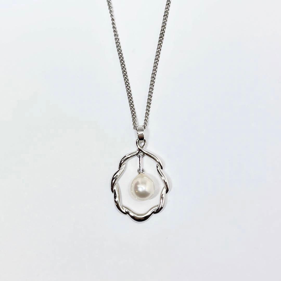 Mikimoto Pearl Pendant Top with 7.1 x 7.5 mm pearl set in silver, displayed on white background