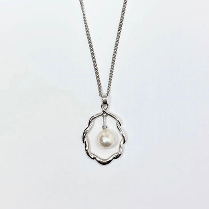 Mikimoto Pearl Pendant Top with 7.1 x 7.5 mm pearl set in silver, displayed on white background