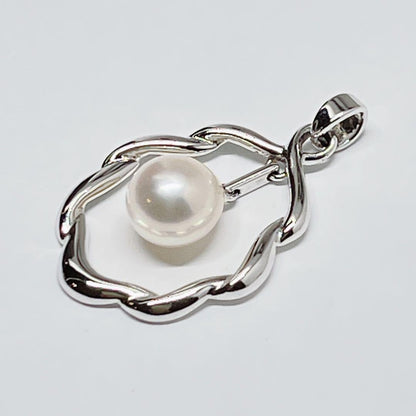 Mikimoto Pearl Pendant Top with 7.1 x 7.5 mm pearl set in silver, displayed on white background