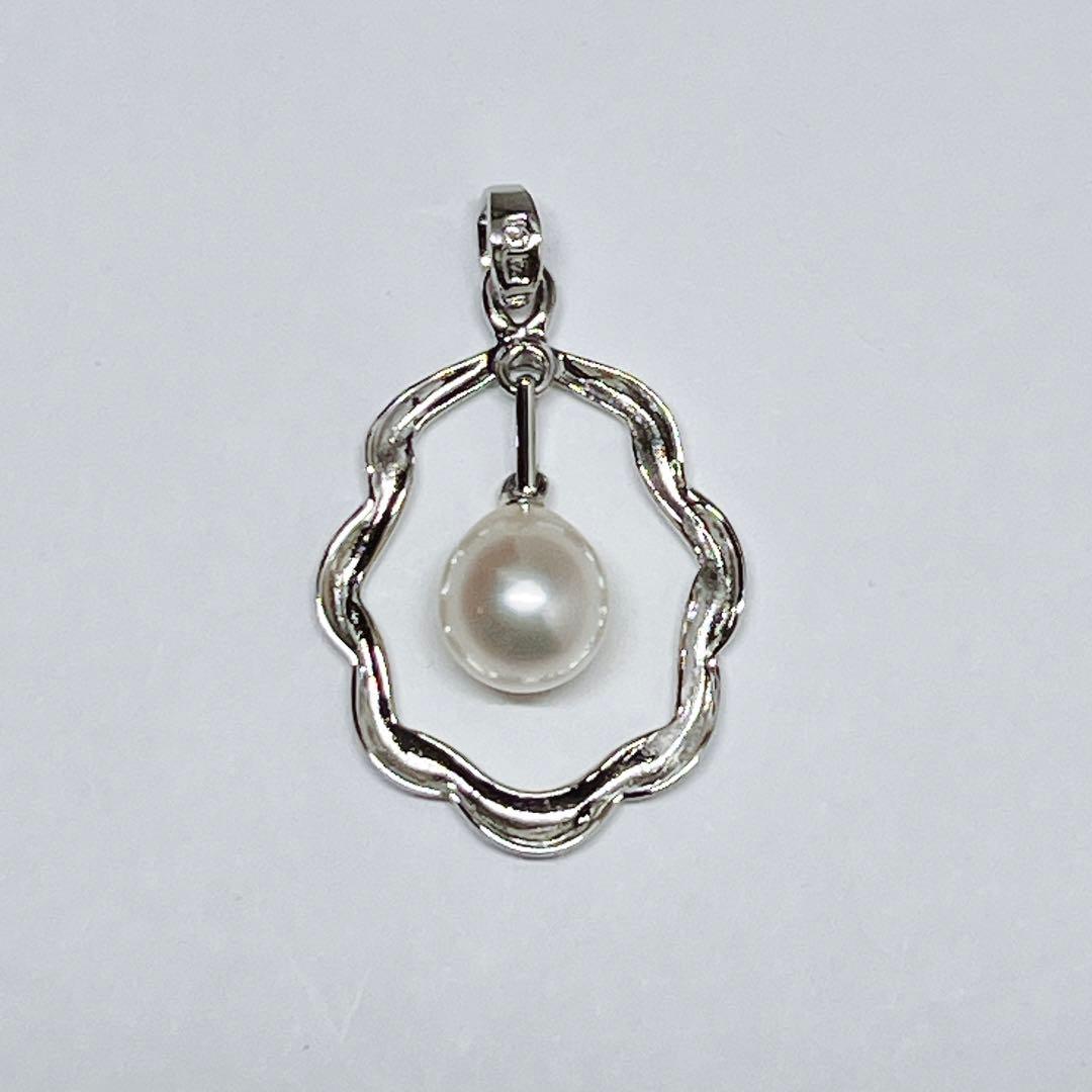 Mikimoto Pearl Pendant Top with 7.1 x 7.5 mm pearl set in silver, displayed on white background