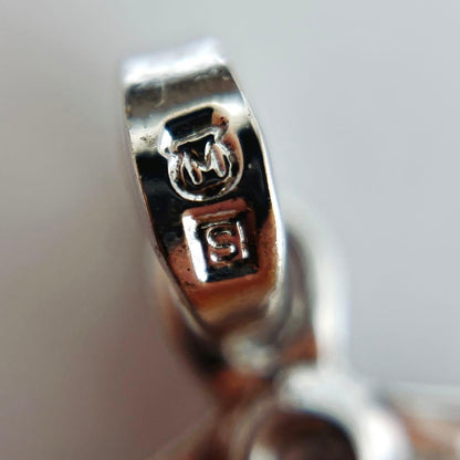 Mikimoto Pearl Pendant Top with 7.1 x 7.5 mm pearl set in silver, displayed on white background