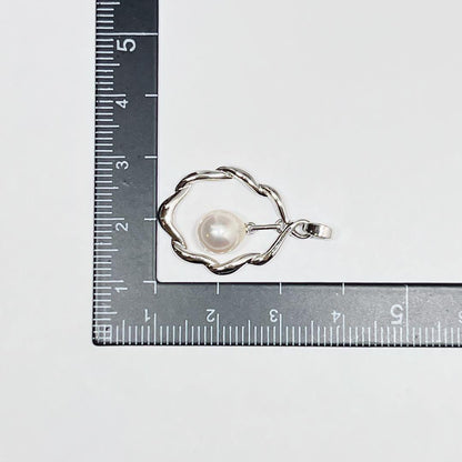 Mikimoto Pearl Pendant Top with 7.1 x 7.5 mm pearl set in silver, displayed on white background