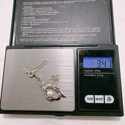 MIKIMOTO silver single Akoya pearl necklace with approximately 40cm chain on white background