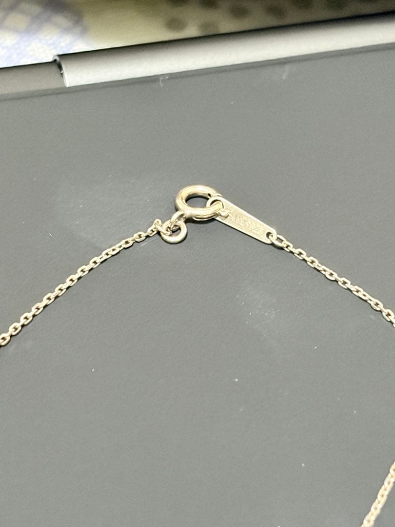 Agete silver necklace featuring sparkling diamonds with no visible damage or discoloration