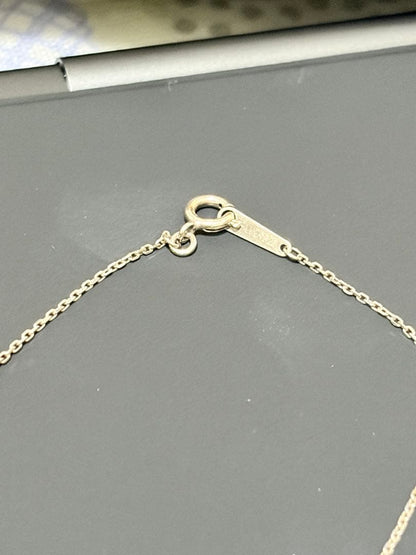 Agete silver necklace featuring sparkling diamonds with no visible damage or discoloration