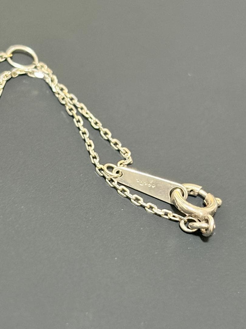Agete silver necklace featuring sparkling diamonds with no visible damage or discoloration