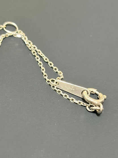Agete silver necklace featuring sparkling diamonds with no visible damage or discoloration